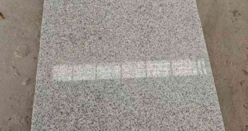 临汾芝麻白光面毛板