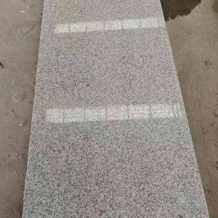 临汾芝麻白光面毛板